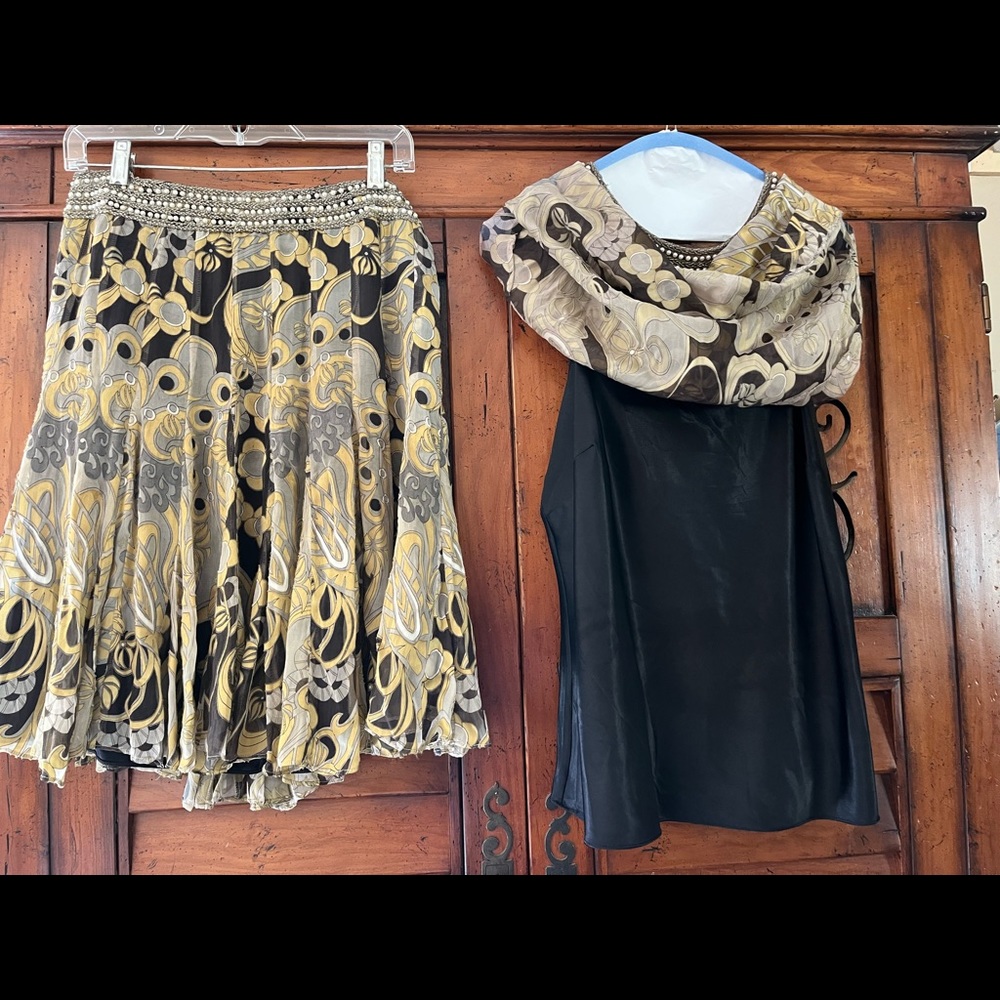 Metallic accents for skirt and top with beadings along collar snd waistline. - Picture 2 of 3